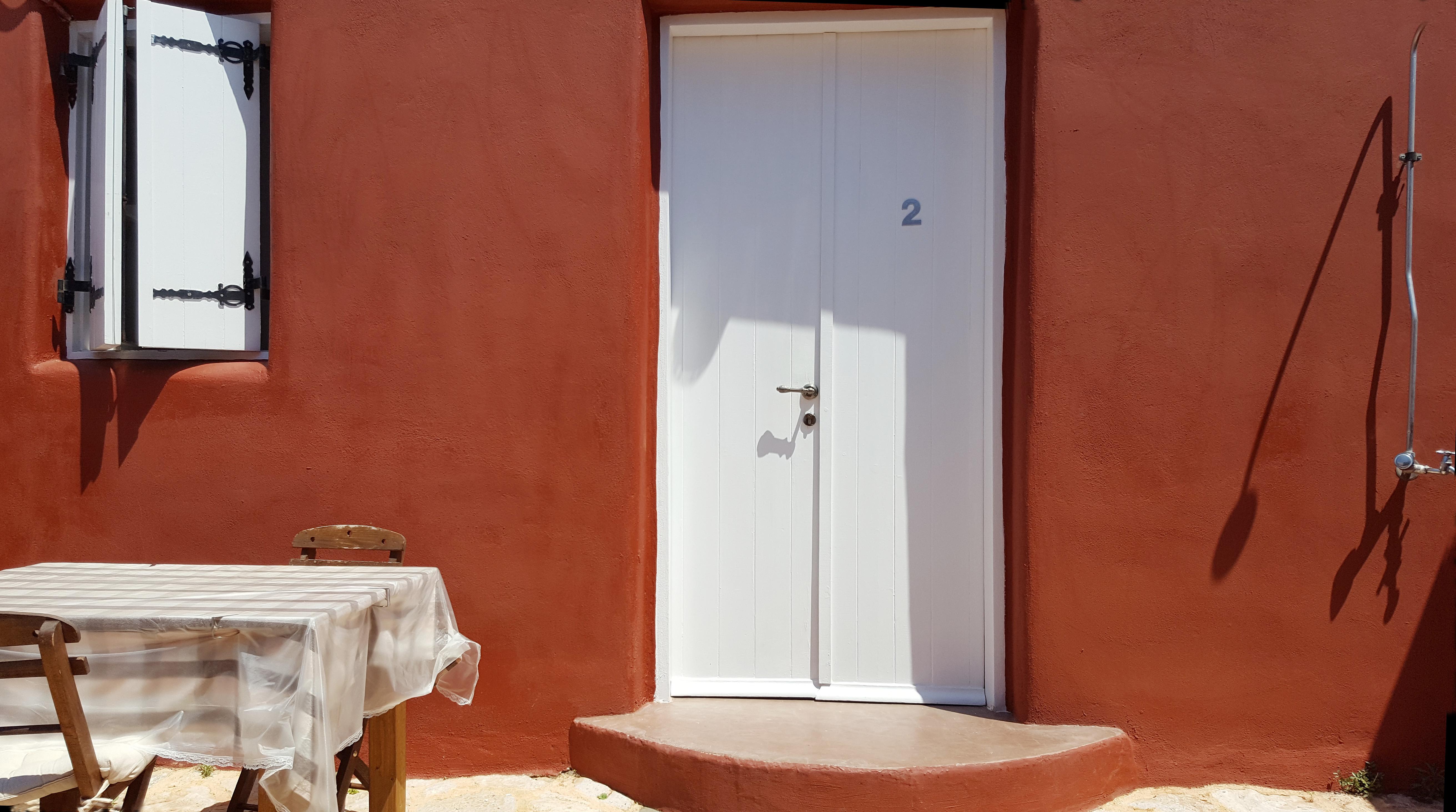 Atlantis Houses Chalki Town Exterior photo