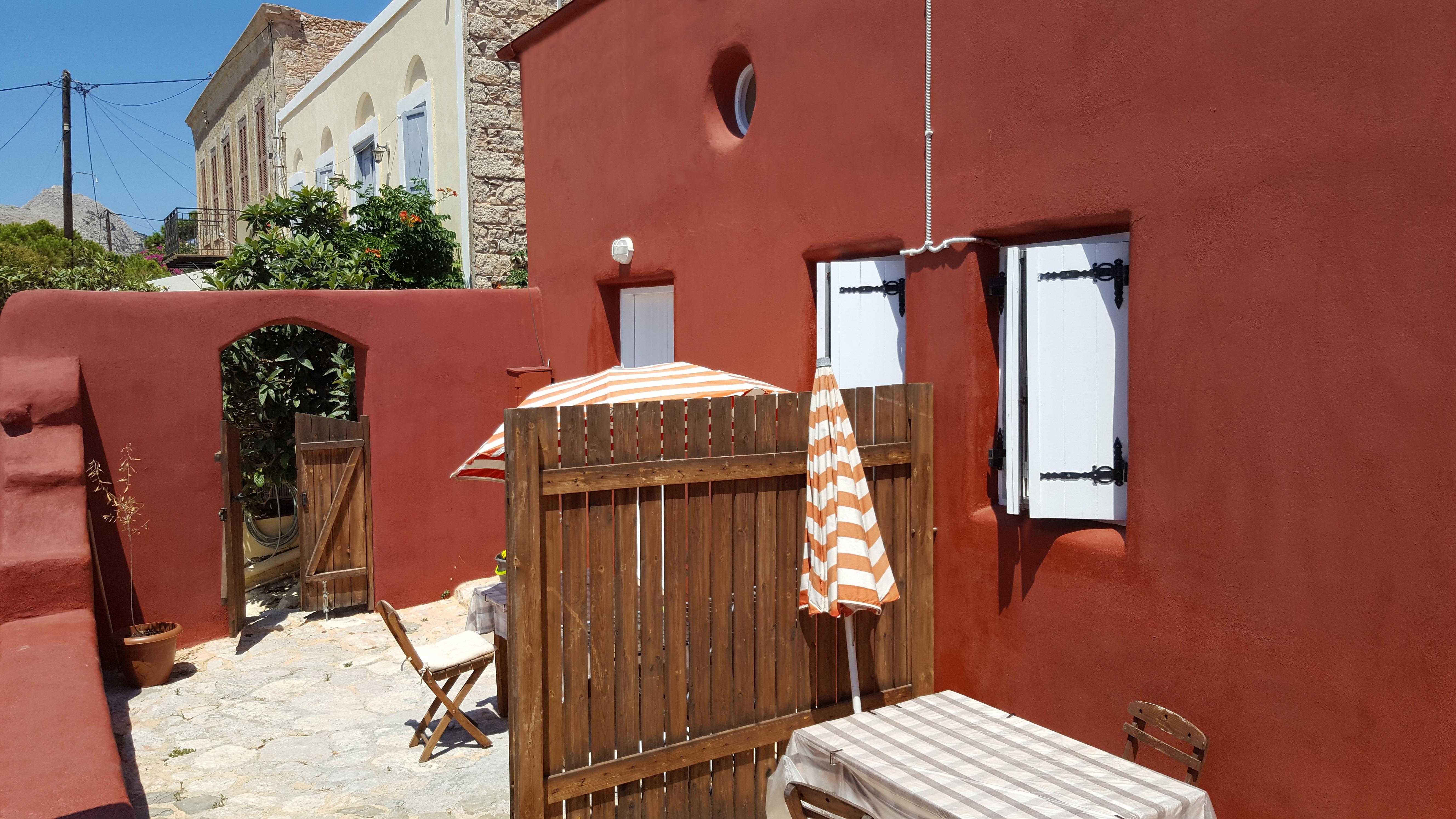 Atlantis Houses Chalki Town Exterior photo