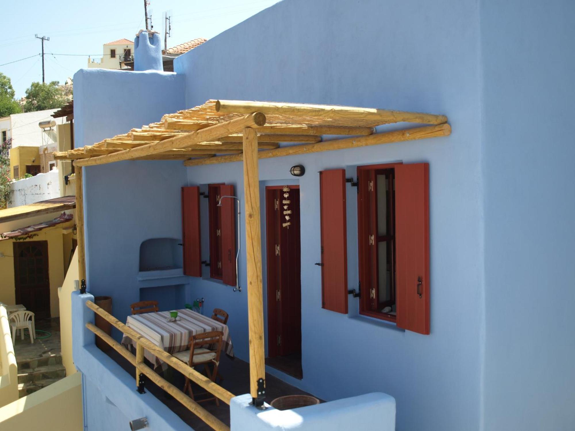 Atlantis Houses Chalki Town Exterior photo
